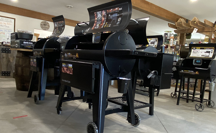 A pair of black grills with their front open